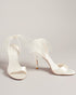 HARINAA-Sandals-Pay attention to the details with HARINAA. These satin sandals are crowned wth a double mesh organza bow at the back and crystal embellishment on the stiletto heels for dazzling elegance. Heeled sandals Oversized mesh ankle bow Satin finish Open toe Slim toe strap Crystal embellished heel detail Slingback design- Ted Baker Romania